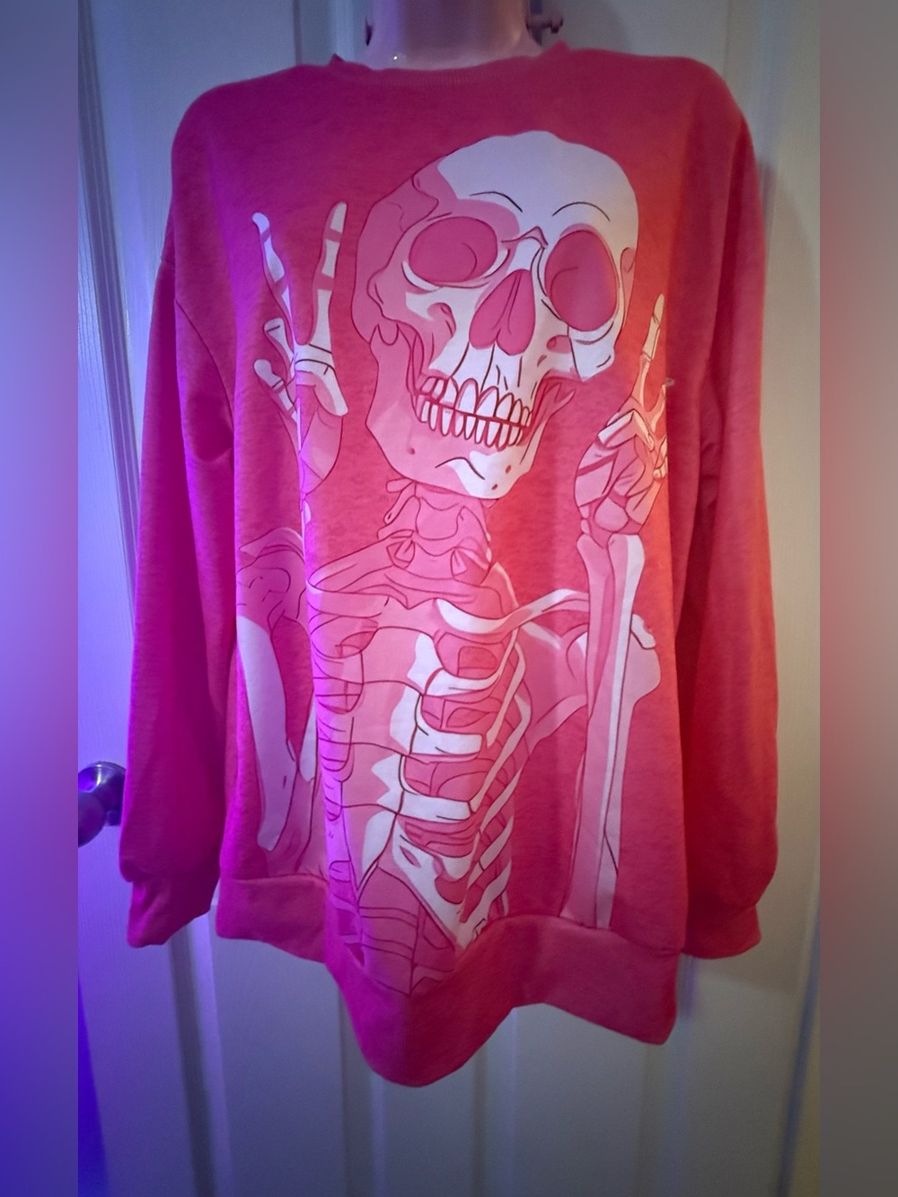 Pink Crewneck Sweater with White Skeleton Graphic